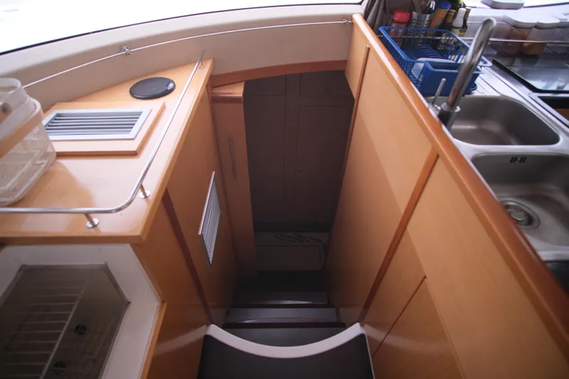 Northern Lynx Yacht Photos Pics Interior of 2011 Fountaine Pajot Salina 48 Evolution Maestro yacht kitchen area.