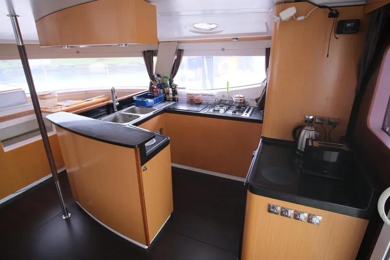 Northern Lynx Yacht Photos Pics Interior of 2011 Fountaine Pajot Salina 48 Evolution Maestro yacht kitchen.