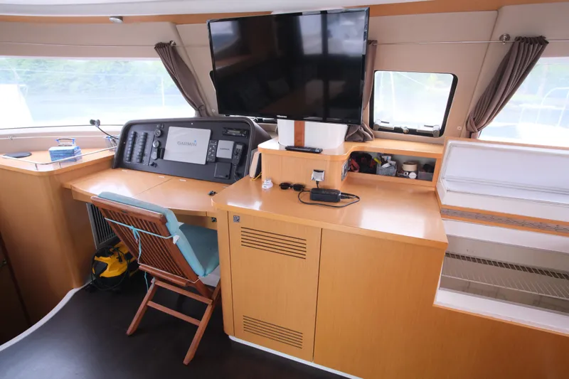 Northern Lynx Yacht Photos Pics Interior of 2011 Fountaine Pajot Salina 48 Evolution Maestro yacht with navigation station.