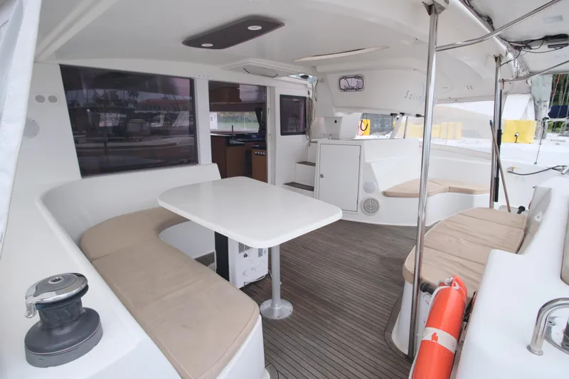 Northern Lynx Yacht Photos Pics Spacious cockpit of 2011 Fountaine Pajot Salina 48 Evolution Maestro catamaran.