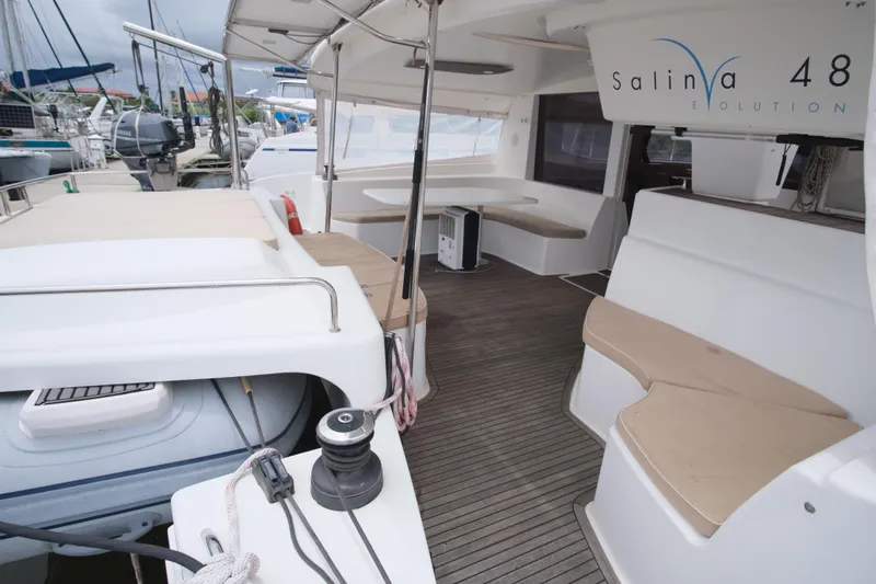 Northern Lynx Yacht Photos Pics 2011 Fountaine Pajot Salina 48 Evolution Maestro yacht, spacious deck with seating area.