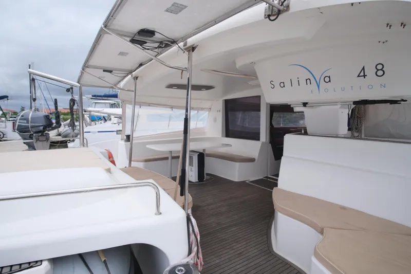 Northern Lynx Yacht Photos Pics 2011 Fountaine Pajot Salina 48 Evolution Maestro catamaran with spacious deck and seating area.