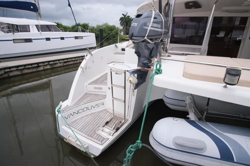 Northern Lynx Yacht Photos Pics Fountaine Pajot Salina 48 Evolution Maestro 2011 yacht with Yamaha motor and dinghy.