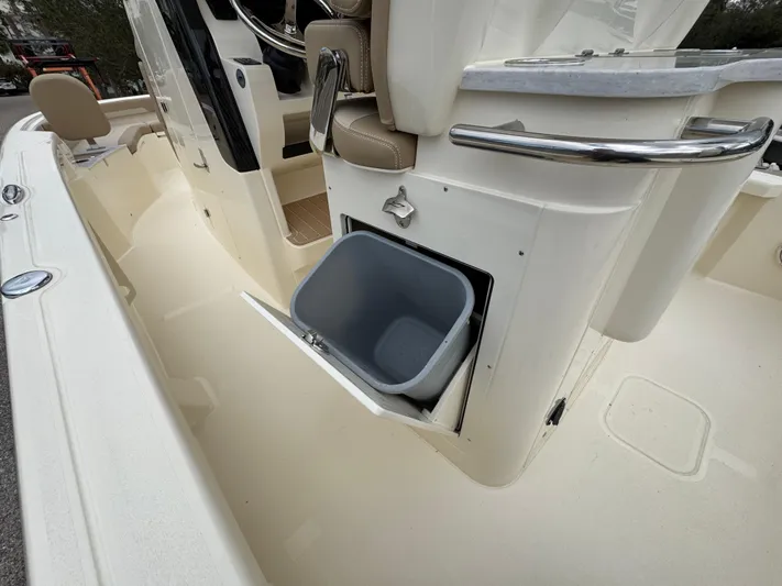  Yacht Photos Pics 2025 Scout 261 XSS boat interior with built-in storage compartment.
