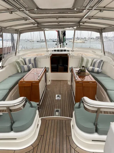 Ravenclaw Yacht Photos Pics Luxurious 2007 Oyster 82/08 yacht interior with elegant seating and wooden accents.