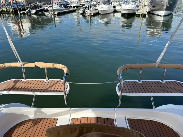  Yacht Photos Pics Hunter 38 sailboat deck overlooking marina with multiple boats, 2005 model.