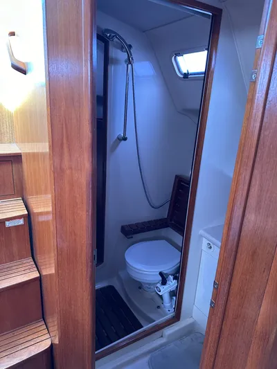  Yacht Photos Pics 2005 Hunter 38 yacht bathroom with shower and toilet.