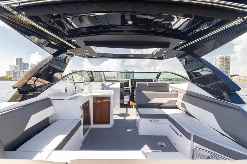  Yacht Photos Pics Luxurious 2021 Cruisers Yachts 38 GLS OB interior with modern seating and sleek design.