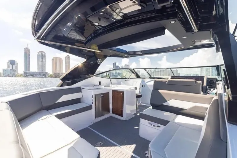 Yacht Photos Pics 2021 Cruisers Yachts 38 GLS OB interior with city skyline view.
