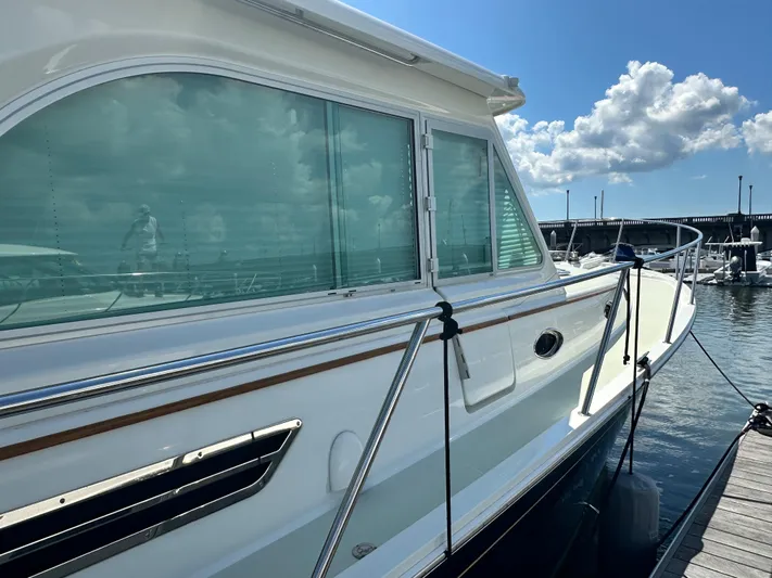 Katahdin Yacht Photos Pics 2020 Back Cove 41 yacht docked under a clear blue sky.