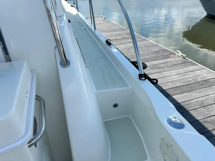 Katahdin Yacht Photos Pics 2020 Back Cove 41 yacht docked, showcasing sleek white deck and stainless steel railings.