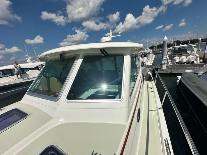 Katahdin Yacht Photos Pics 2020 Back Cove 41 yacht docked under a partly cloudy sky.