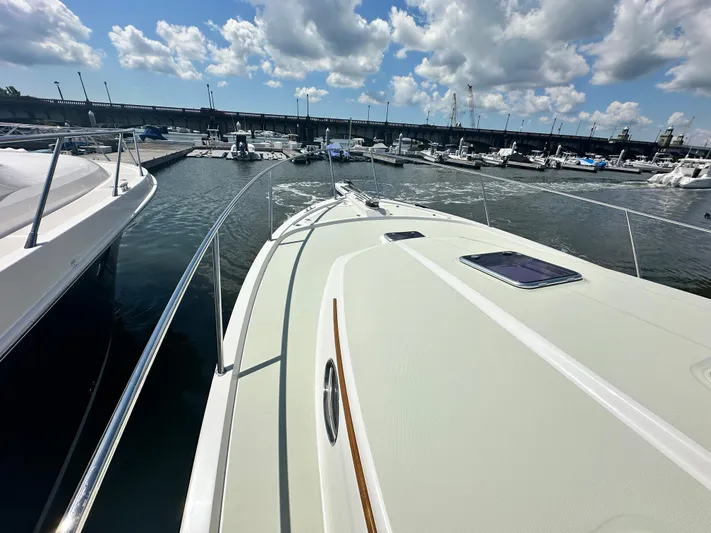 Katahdin Yacht Photos Pics 2020 Back Cove 41 yacht docked at marina under partly cloudy sky.