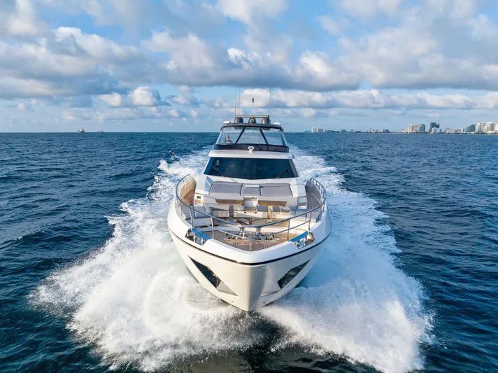  Yacht Photos Pics 2020 Ferretti Yachts 920 cruising on open sea under blue sky.