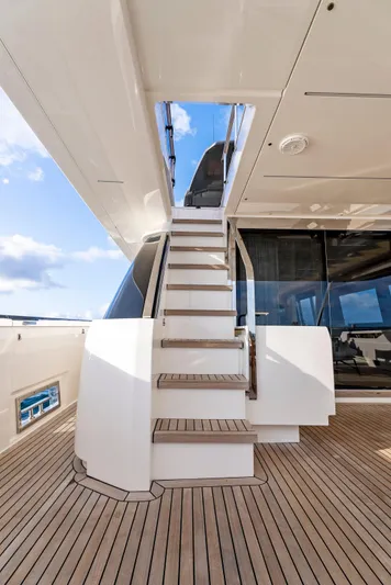  Yacht Photos Pics Staircase on 2020 Ferretti Yachts 920, featuring sleek design and wooden deck.