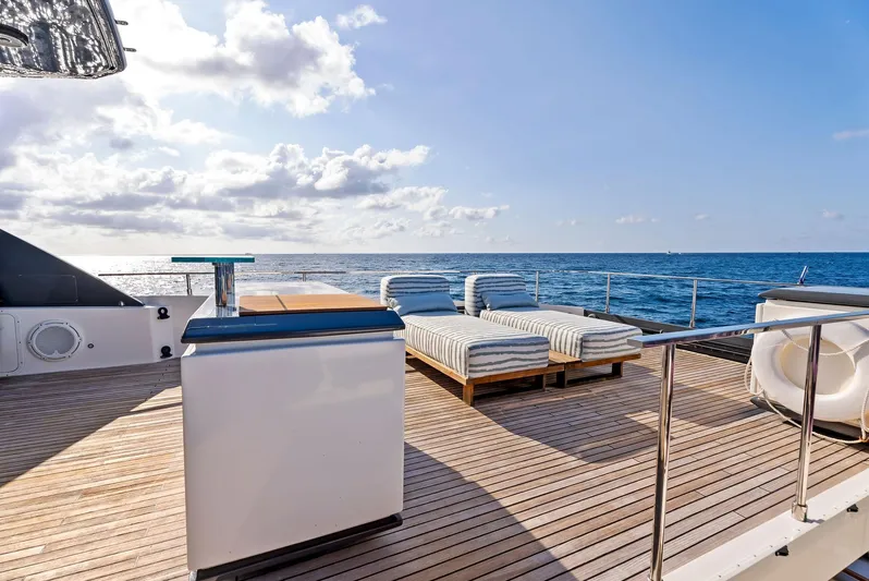  Yacht Photos Pics Luxurious 2020 Ferretti Yachts 920 deck with sun loungers and ocean view.