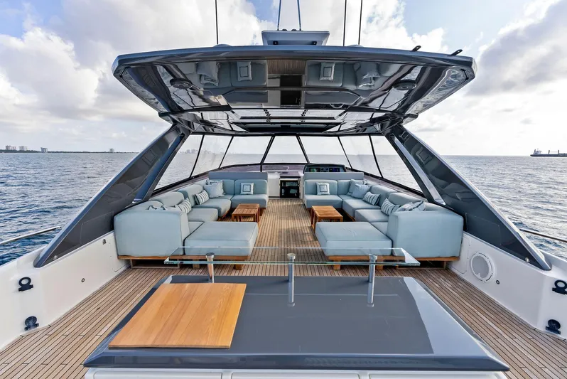  Yacht Photos Pics Luxurious 2020 Ferretti Yachts 920 with spacious deck and elegant seating on open water.