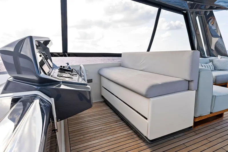  Yacht Photos Pics Luxurious 2020 Ferretti Yachts 920 interior with sleek helm and comfortable seating.