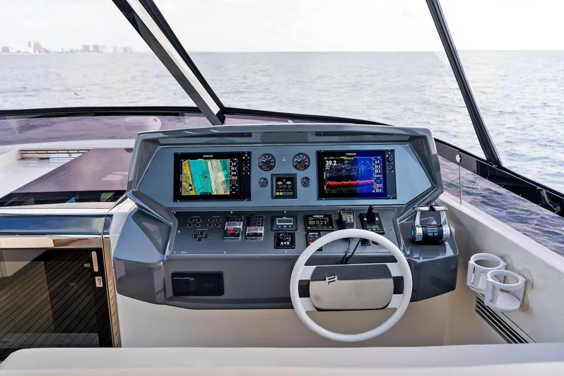  Yacht Photos Pics 2020 Ferretti Yachts 920 helm with advanced navigation systems and ocean view.