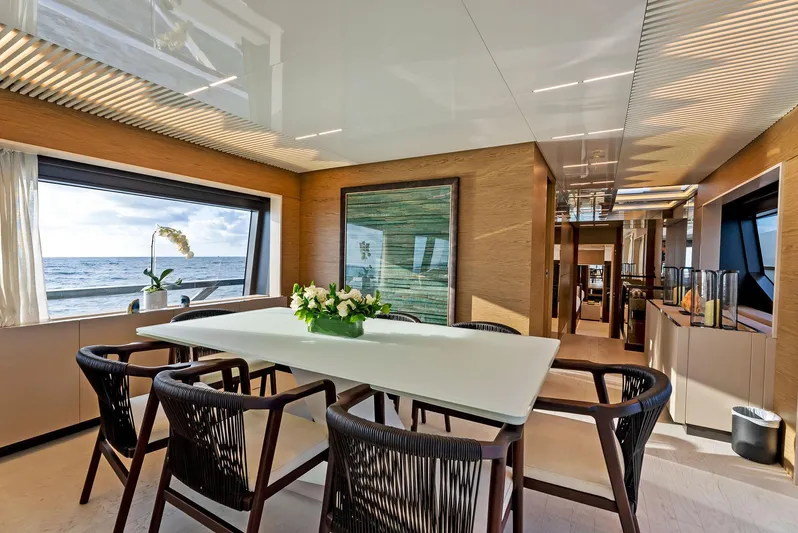  Yacht Photos Pics Luxurious interior of 2020 Ferretti Yachts 920 with elegant dining area and ocean view.
