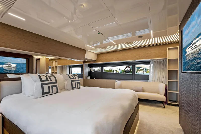 Yacht Photos Pics Luxurious bedroom interior of 2020 Ferretti Yachts 920 with modern design and large windows.