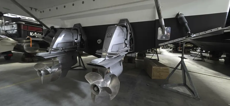  Yacht Photos Pics 2020 Jeanneau NC 37 boat propellers in a storage facility.