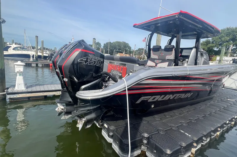  Yacht Photos Pics 2021 Fountain 39 NX boat docked, featuring powerful Mercury Racing 450 engines.