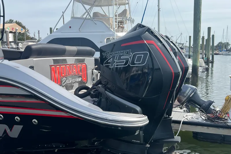  Yacht Photos Pics 2021 Fountain 39 NX boat with powerful Racing 450 engine at marina.