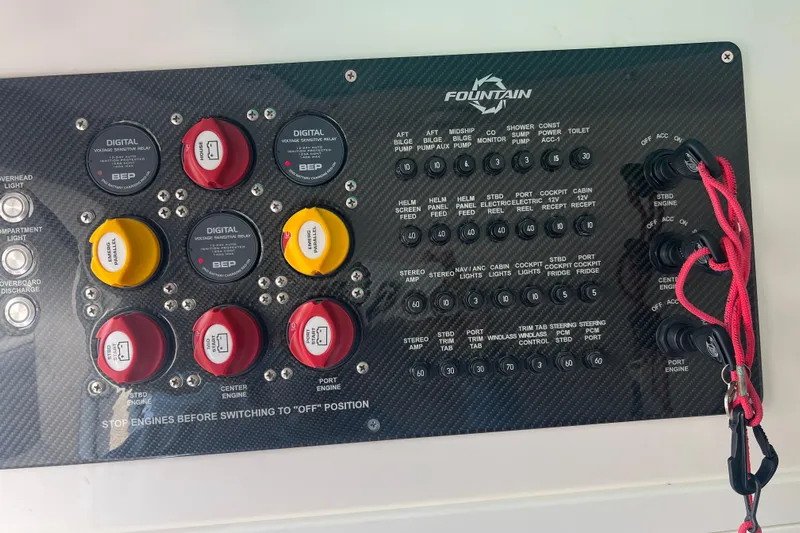  Yacht Photos Pics Control panel of a 2021 Fountain 39 NX boat with switches and relays.