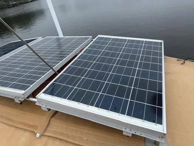 Jet Stream Yacht Photos Pics Solar panels on a 2003 Wauquiez Centurion 45s yacht by the water.