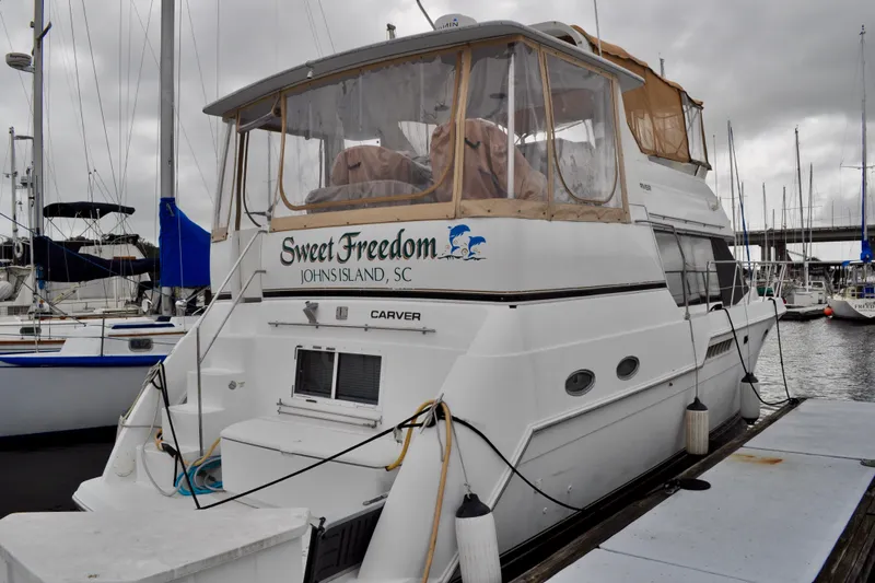 Sweet Freedom Yacht Photos Pics 1999 Carver 406 Aft Cabin Motor Yacht docked, named "Sweet Freedom," Johns Island, SC.