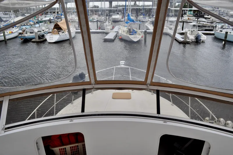 Sweet Freedom Yacht Photos Pics View from 1999 Carver 406 Aft Cabin Motor Yacht in marina setting.