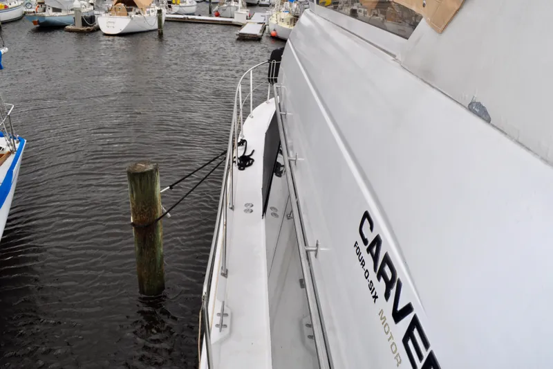 Sweet Freedom Yacht Photos Pics 1999 Carver 406 Aft Cabin Motor Yacht docked at marina.