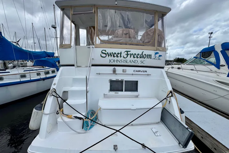 Sweet Freedom Yacht Photos Pics 1999 Carver 406 Aft Cabin Motor Yacht docked, named "Sweet Freedom," Johns Island, SC.