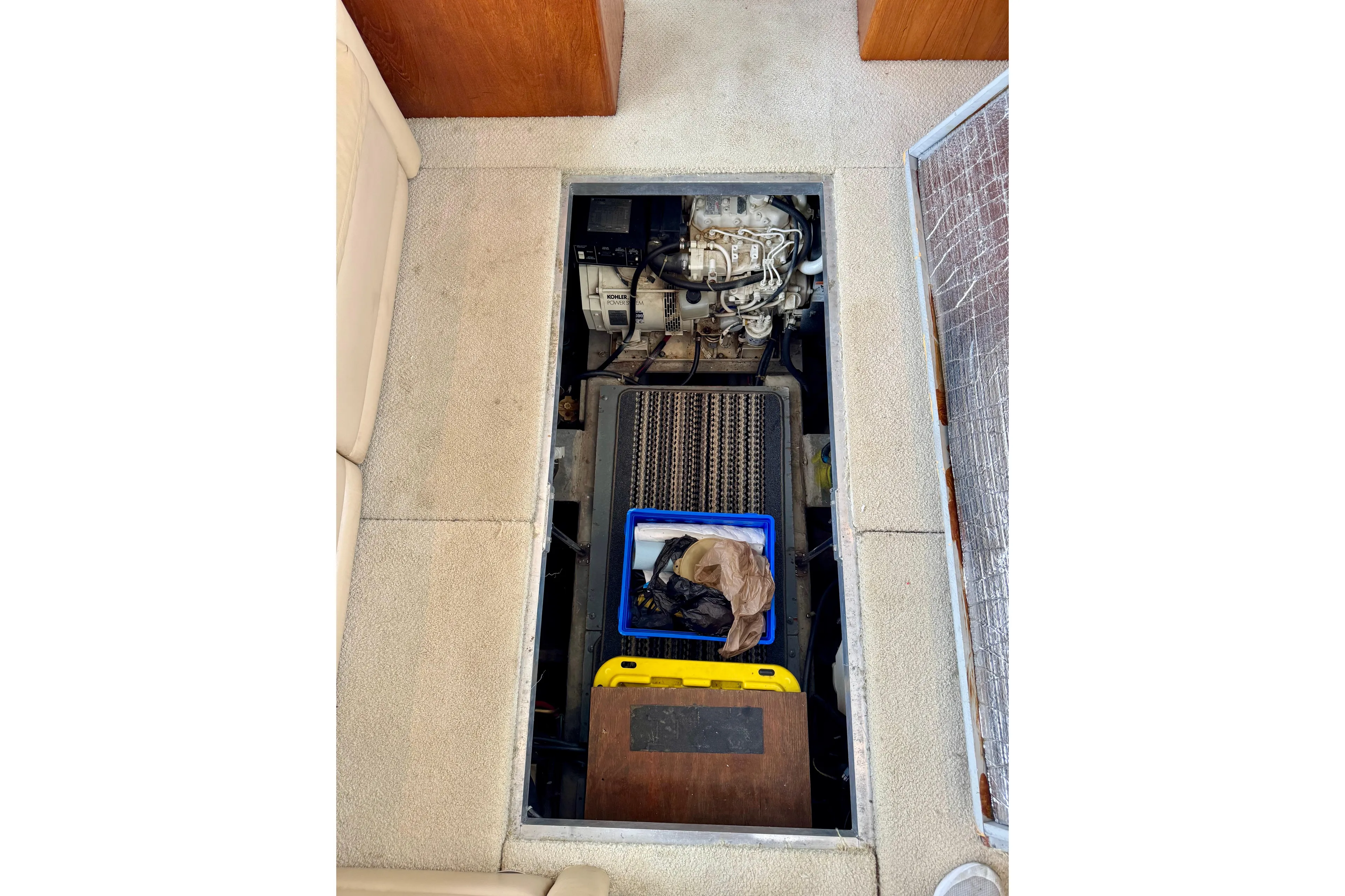 Sweet Freedom Yacht Photos Pics Engine compartment of 1999 Carver 406 Aft Cabin Motor Yacht, showing mechanical components.