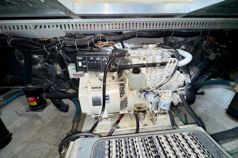 Sweet Freedom Yacht Photos Pics Engine room of 1999 Carver 406 Aft Cabin Motor Yacht with Kohler power system.