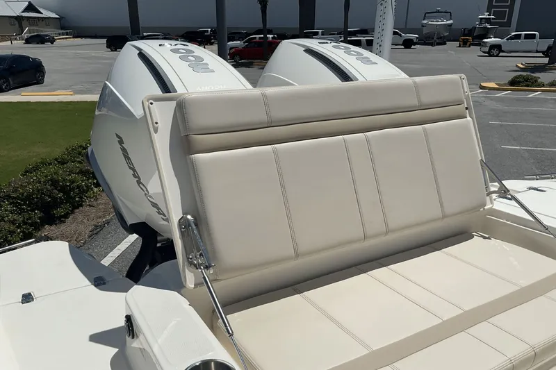 Yacht Photos Pics 2024 Boston Whaler 28 Dauntless boat with dual Mercury engines and cushioned seating.
