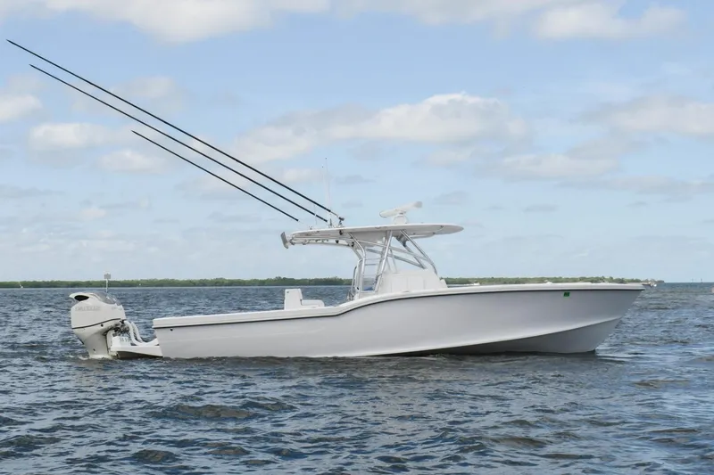  Yacht Photos Pics 2019 Ocean Master 336 Center Console boat on open water.