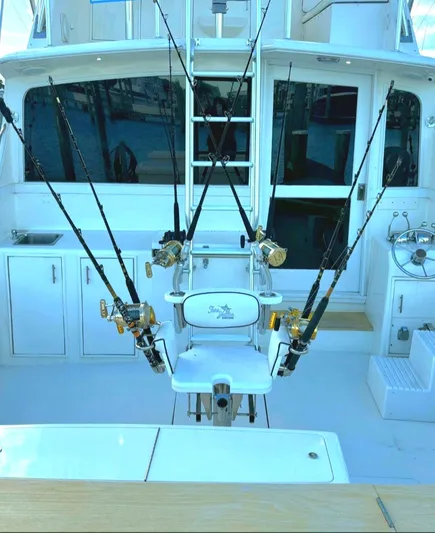 In 2 Deep Yacht Photos Pics 1984 Ocean Yachts 46 Super Sport fishing cockpit with multiple rods and reels.