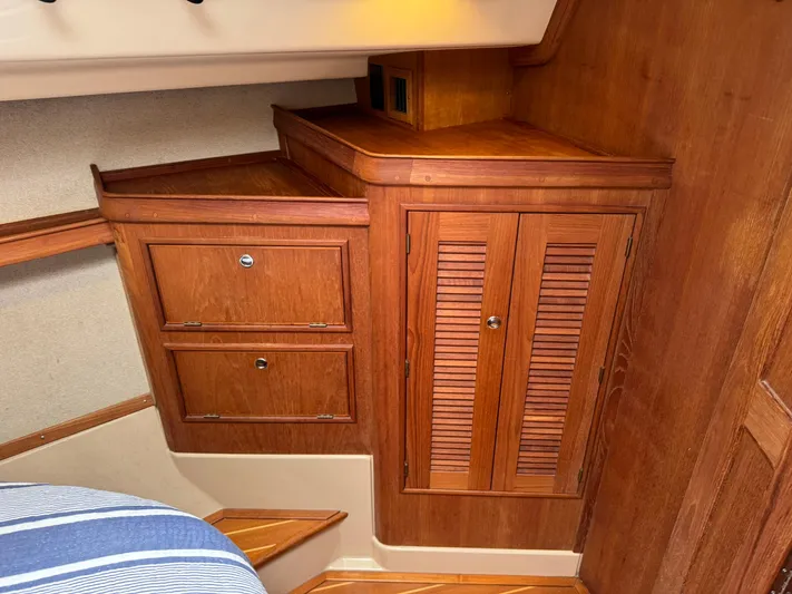 Odyssey Yacht Photos Pics Interior wood cabinetry on a 2002 Island Packet 380 sailboat.