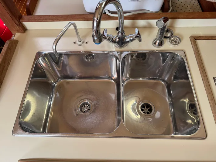 Odyssey Yacht Photos Pics Stainless steel double sink on 2002 Island Packet 380 yacht.