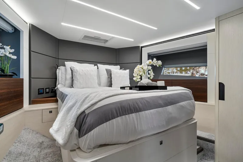 Smile Yacht Photos Pics Luxurious bedroom interior of 2023 Astondoa 66 Flybridge yacht with modern design and elegant decor.