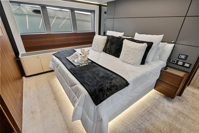 Smile Yacht Photos Pics Luxurious bedroom interior of 2023 Astondoa 66 Flybridge yacht with modern design.