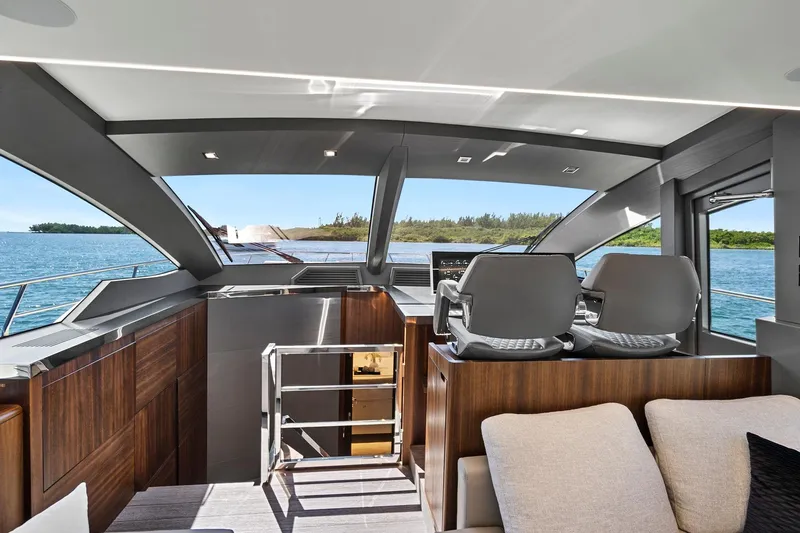 Smile Yacht Photos Pics Luxurious interior of 2023 Astondoa 66 Flybridge yacht with ocean view.