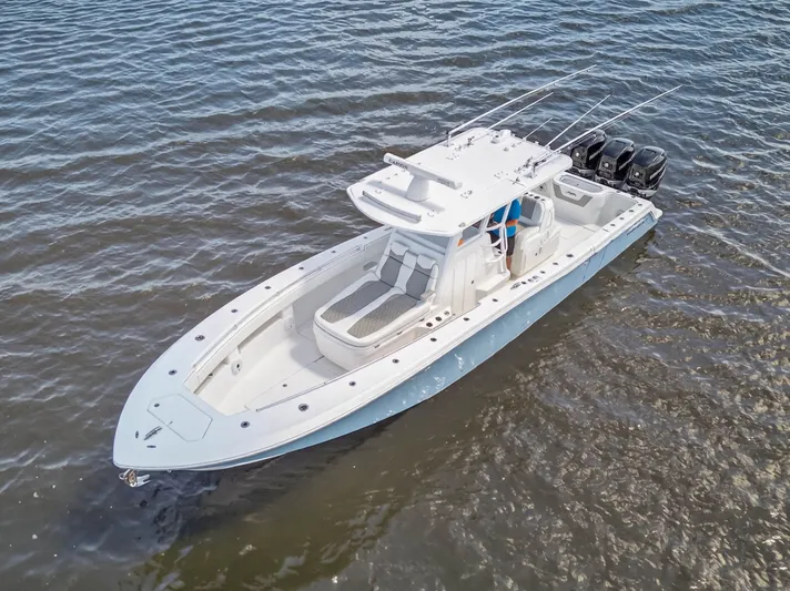  Yacht Photos Pics 2023 Invincible 36 Open Fisherman on calm waters.