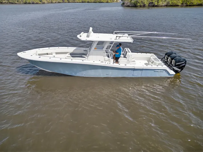  Yacht Photos Pics 2023 Invincible 36 Open Fisherman on calm waters.