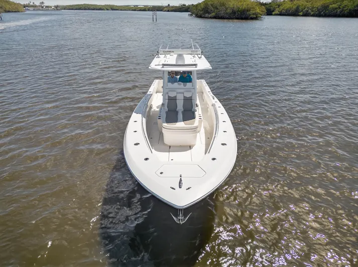  Yacht Photos Pics 2023 Invincible 36 Open Fisherman on calm waters.