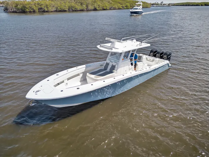  Yacht Photos Pics 2023 Invincible 36 Open Fisherman on calm waters.