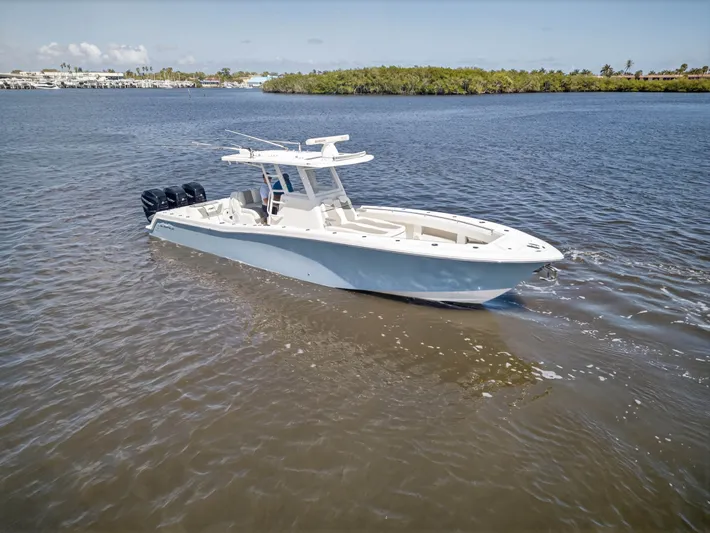  Yacht Photos Pics 2023 Invincible 36 Open Fisherman on calm waters.