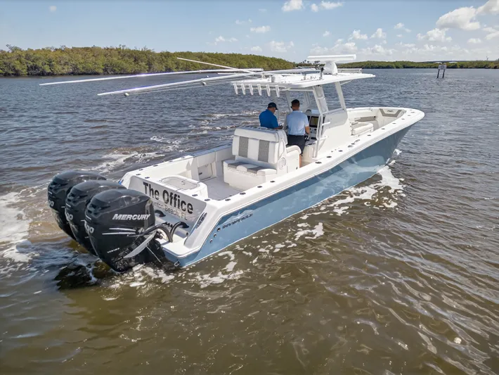  Yacht Photos Pics 2023 Invincible 36 Open Fisherman on water with three Mercury engines.